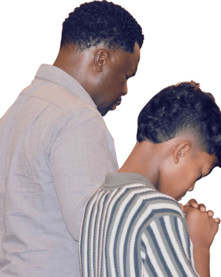 Father & son bowing their head to pray