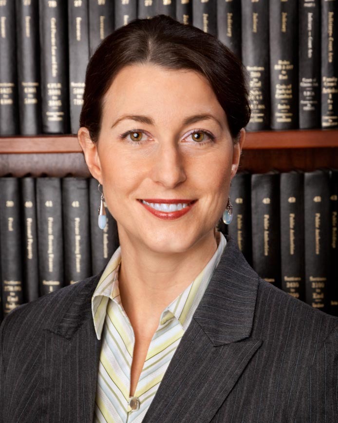 Headshot of lawyer in conference room