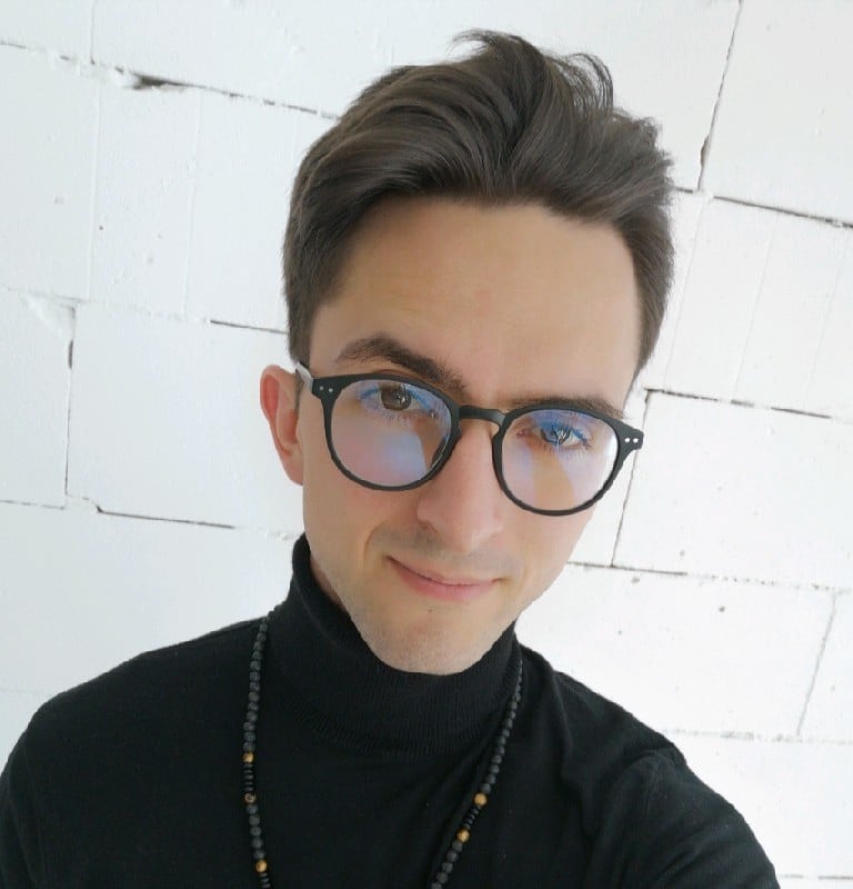 A handsome copywriter with glasses