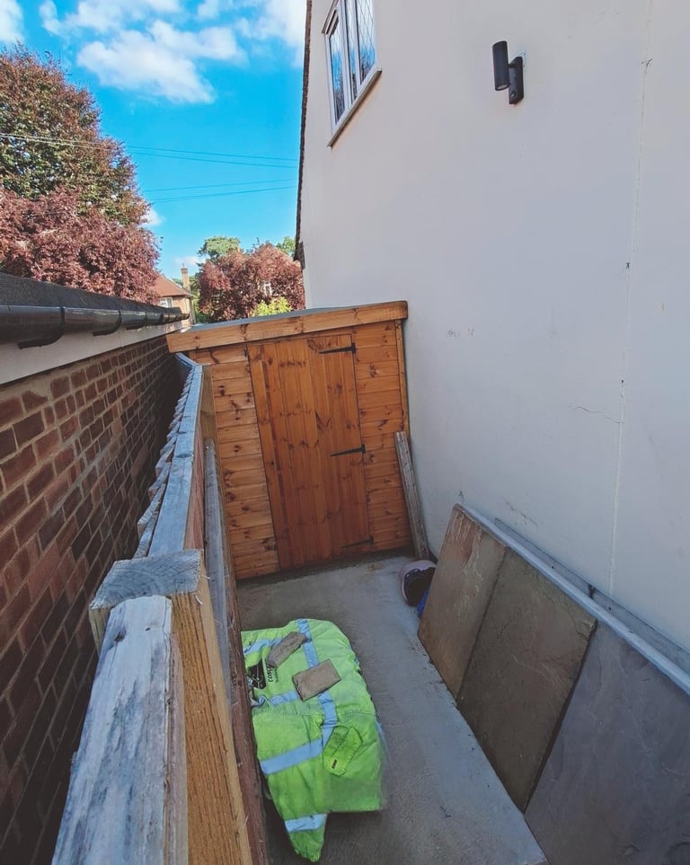 www.truthincontext.co.uk Rosa and Murray Bell's new 2025 shed pushing over Myers 2023 boundary fence