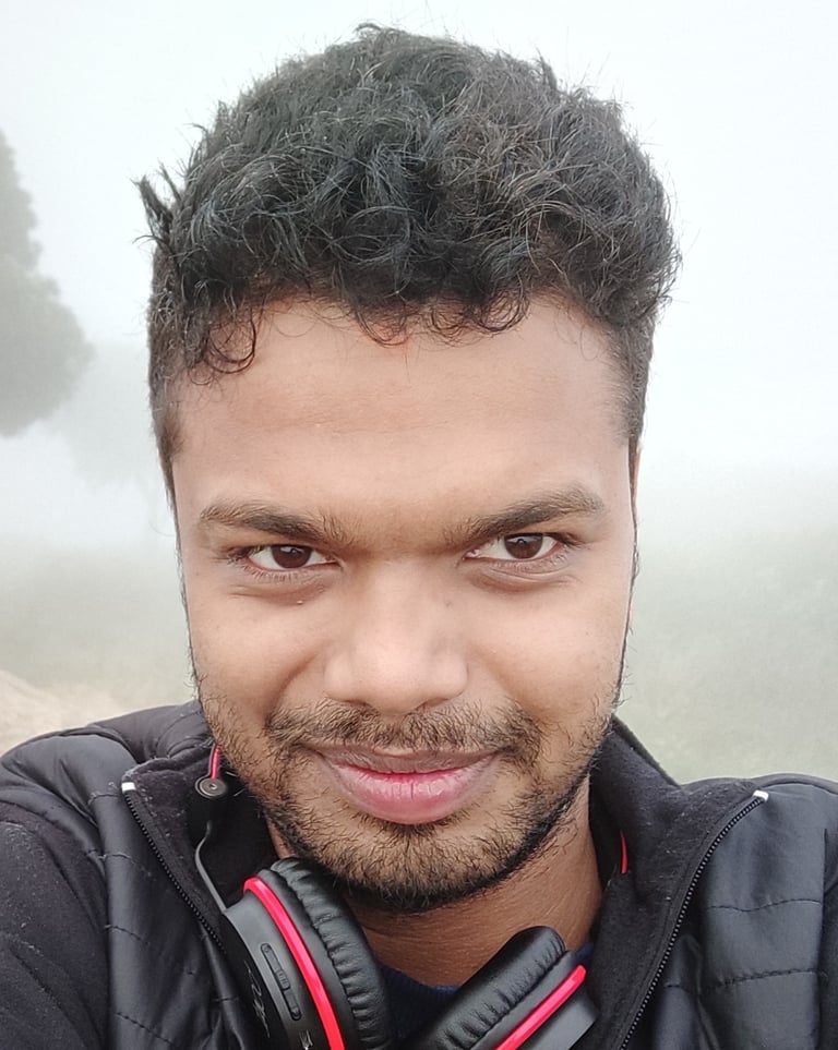 a man with headphones on a foggy day