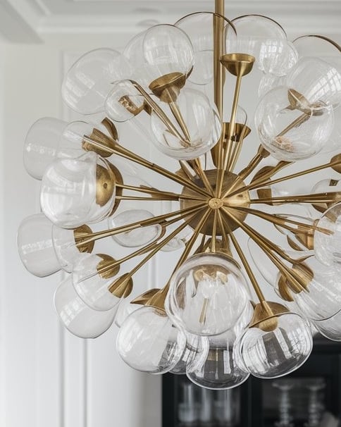 a dining room with a chandelier chandelier and a chandelier