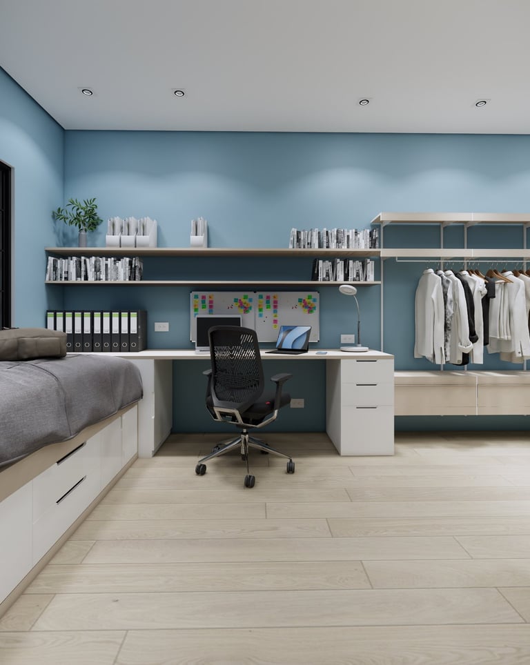 Modern bedroom home office with blue walls, built-in desk, shelving, and organized open closet.