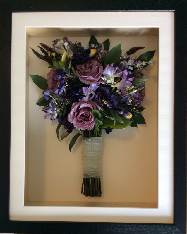 a purple side view preserved wedding bouquet in a frame