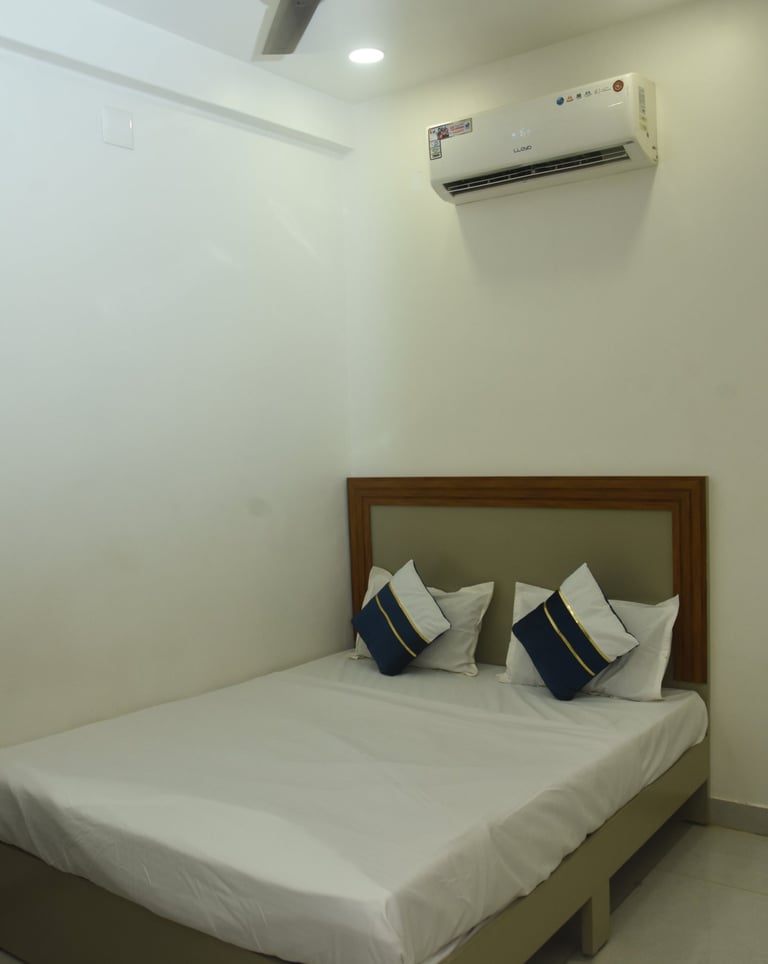 a nice and clean room at HOTEL JK Morbi