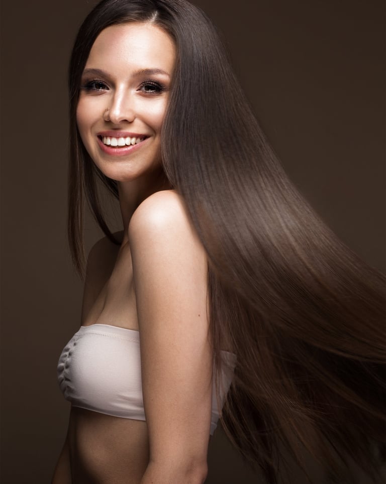 A white lady with long brown hair