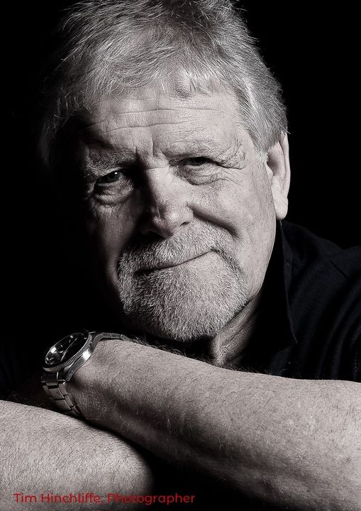 a man with a watch on his wrist