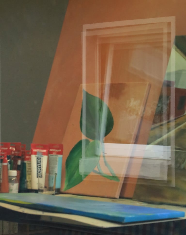 Acrylic leaf painting on canvas sitting on a studio easel next to professional paint tubes.