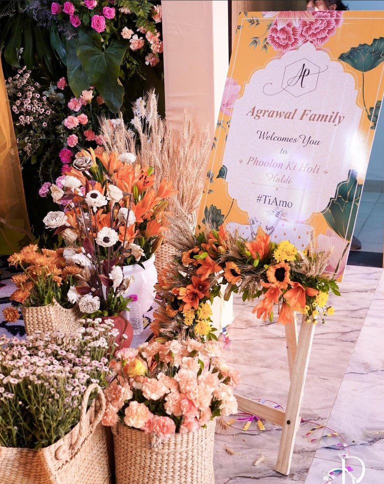 a display of flowers and plants in baskets