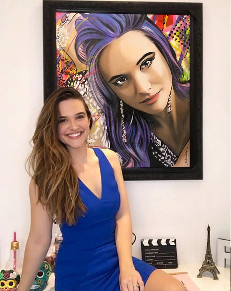 Contemporary pop-art works adorn the gallery walls.