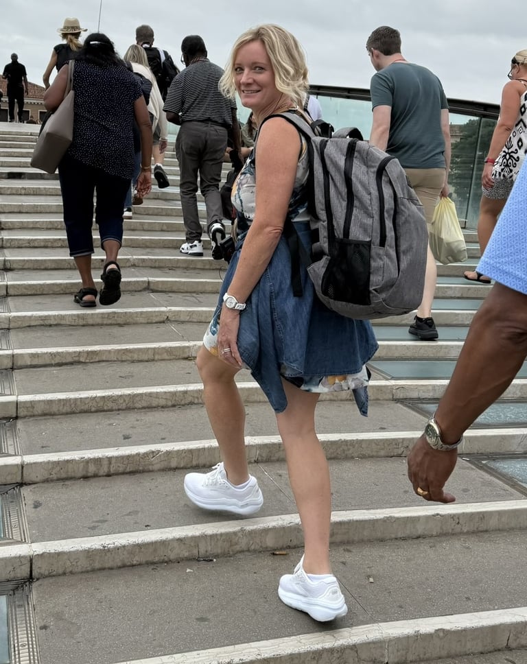 Me walking over the Constitution Bridge in Venice with my fully packed travel backpack