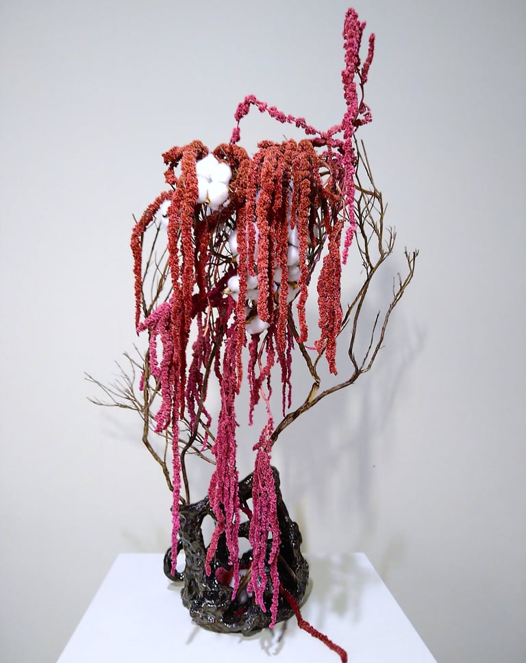 Sogetsu Ikebana composition by Hedy Leung at Giardina, Messe Zurich, featuring cotton plant, and vessel by Dorothee Sauter