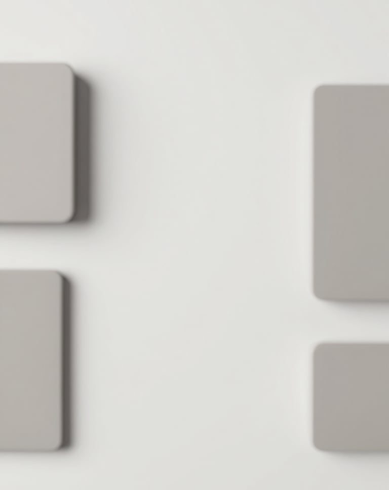 Lifestyle flat lay of high-end accessories. Minimalist composition with lots of white space. Muted tones of #D8D8D8 and #F8F5F2. High-end agency style.