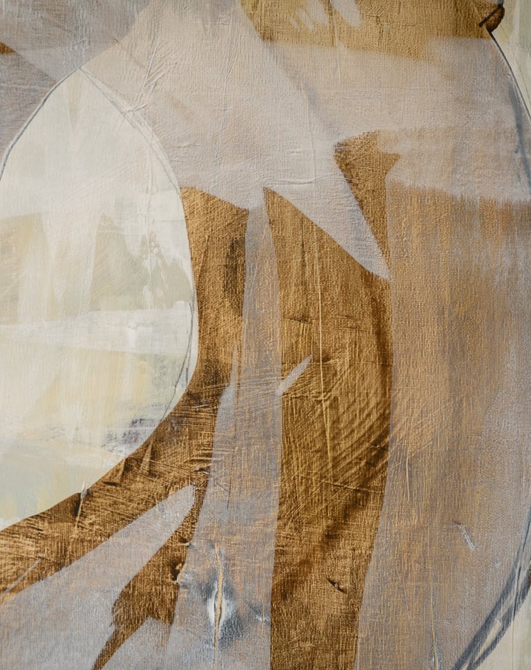 Abstract painting with gold, white, and grey brushstrokes, showcasing modern texture and canvas detail.