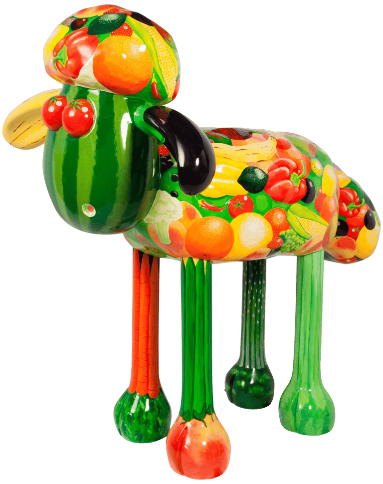 A large street sculpture of Shaun the Sheep painted with fruit and vegetables by Laura Fearn.