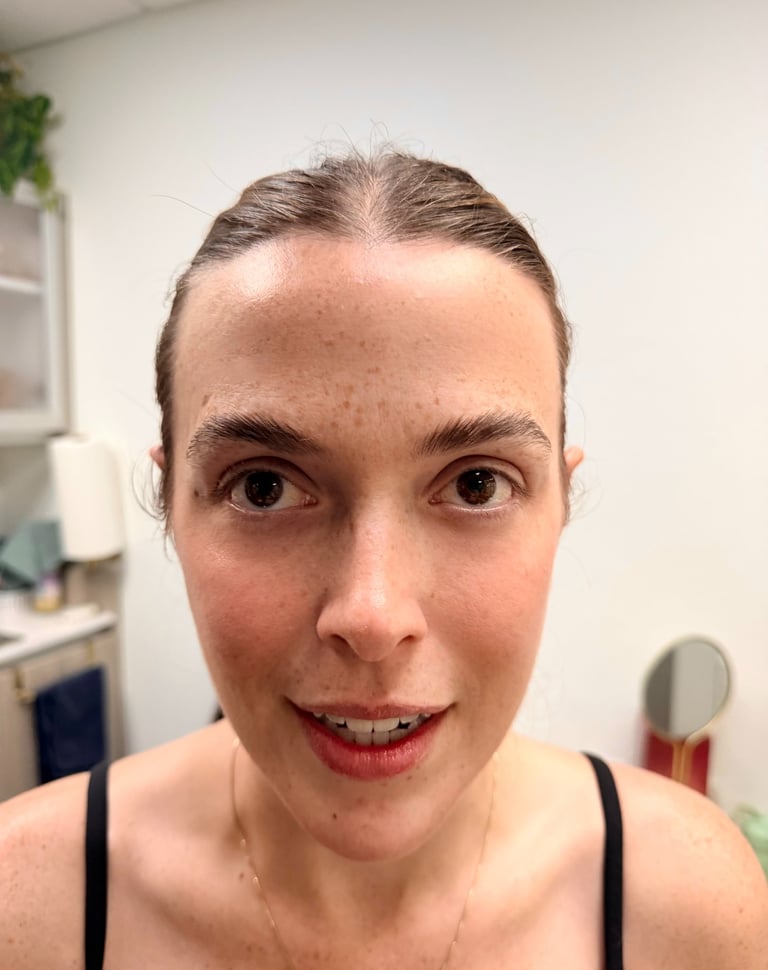 Natural lashes before extensions, forward-set green eyes