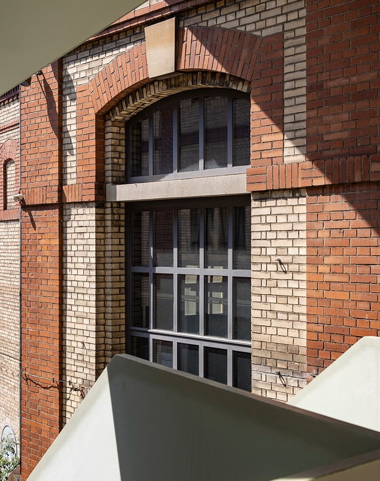 a building with a clock towering over a building