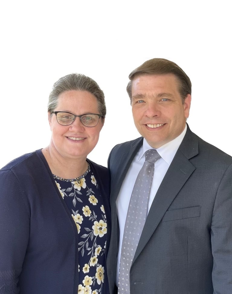 a man and woman standing next to each other