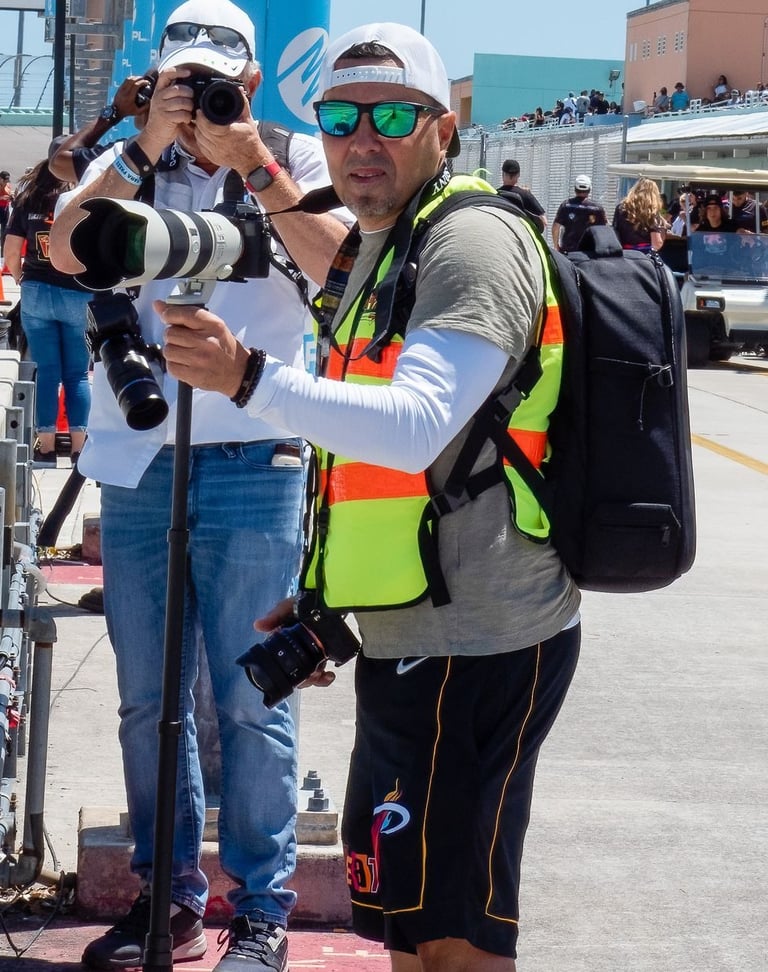 a man taking a picture of a camera