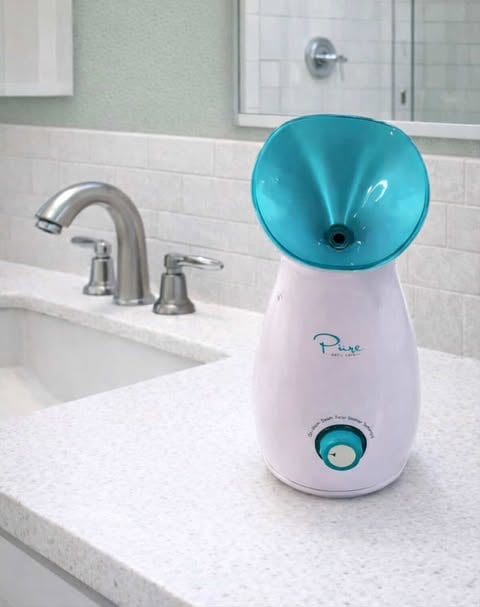 NanoSteamer Pro Facial Steamer on a bathroom sink