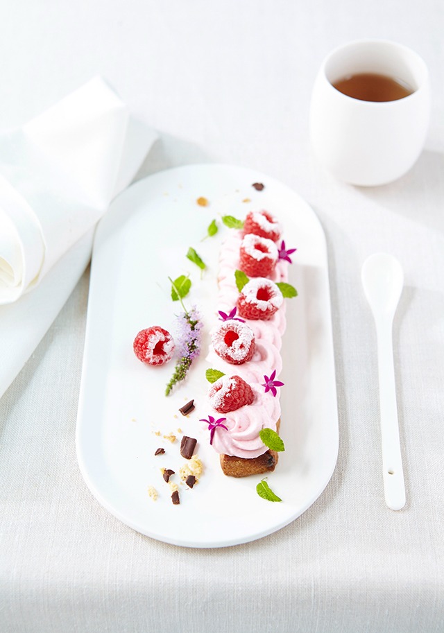 a dessert with a cup of coffee and a cup of coffee