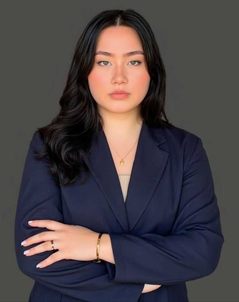 a woman in a suit and a suit jacket
