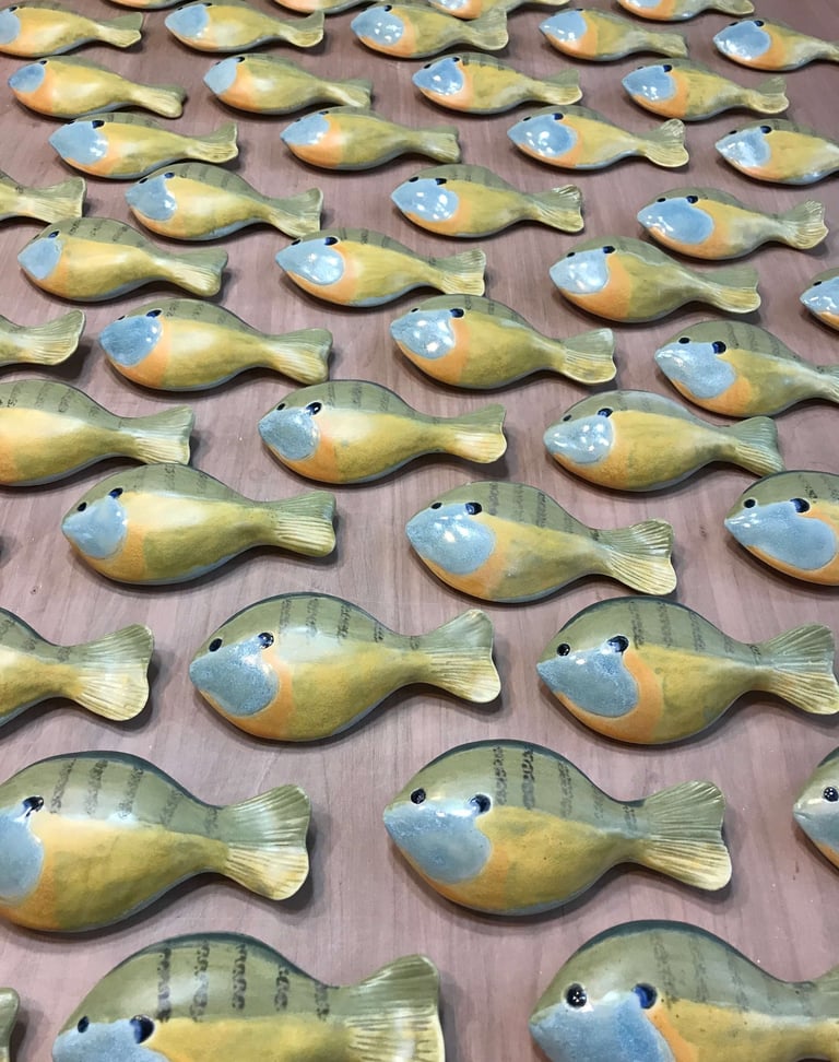 Ceramic blue gill sunfish on a table