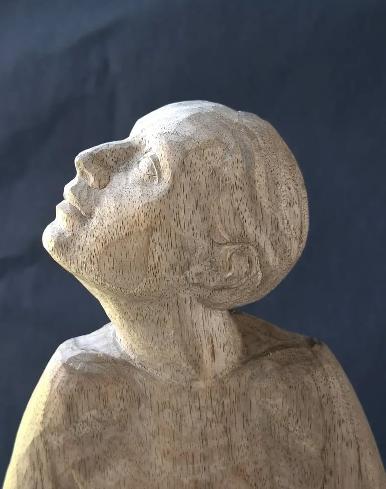 a statue of a woman looking for hope