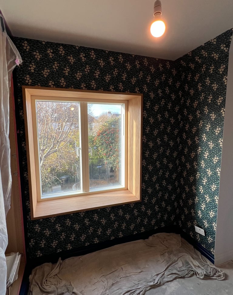 Portslade renovation with floral patterned wallpaper, an oak window frame.
