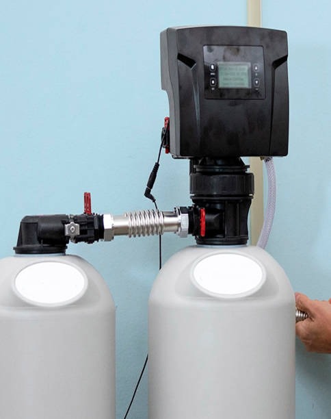 water softener system on home