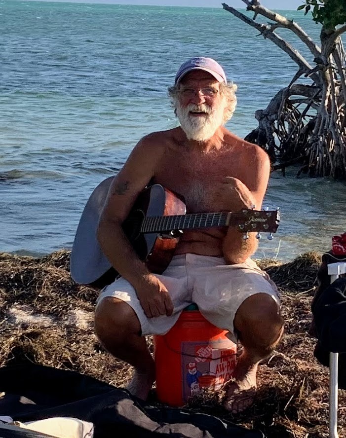 a man with a guitar and a guitar
