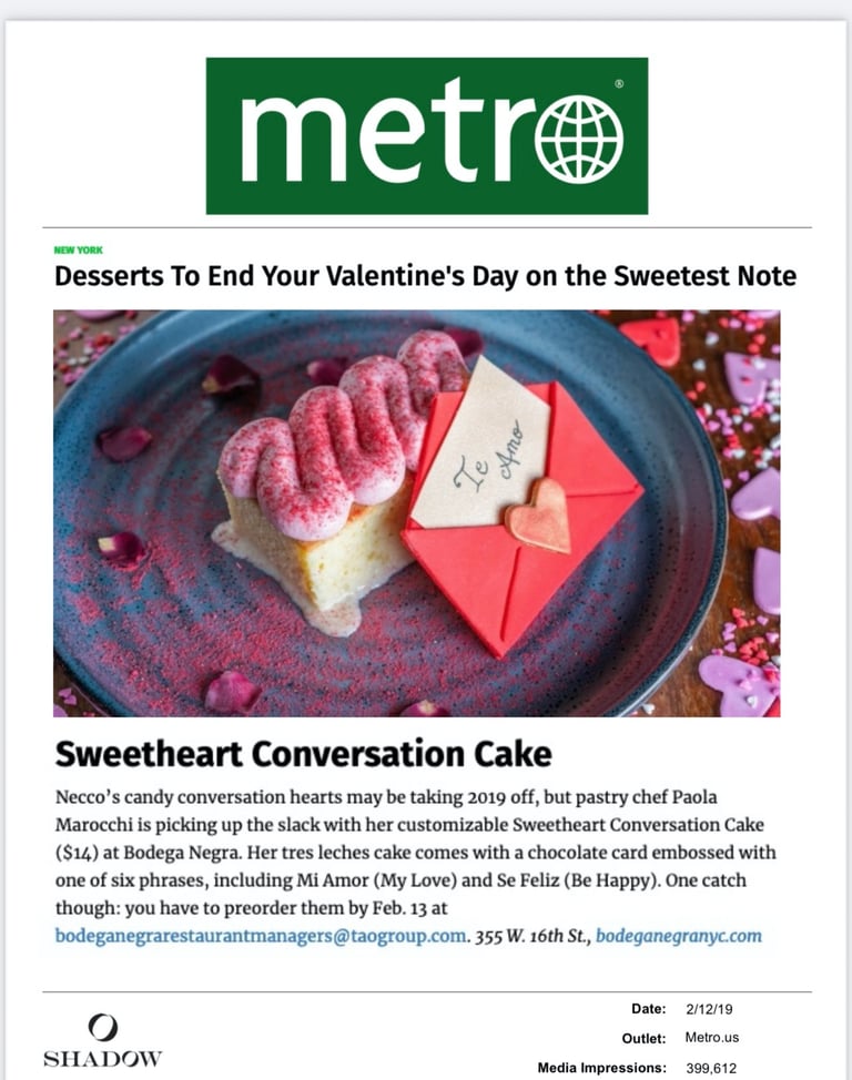a dessert with a heart shaped cake on a plate
