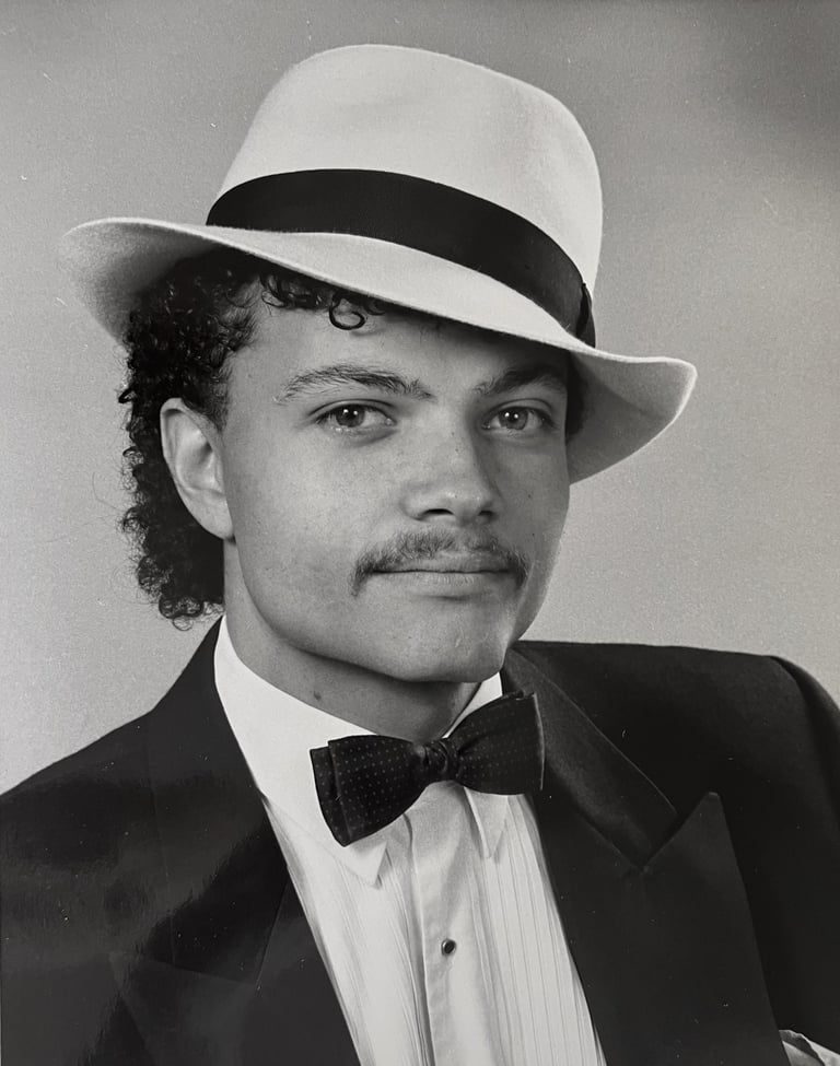 Jon Yon wearing a black and white hat