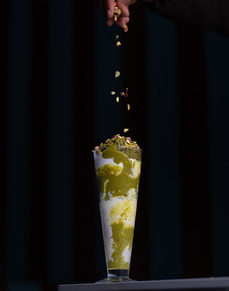 Aesthetic dessert videography featuring a pistachio milkshake with crushed nuts for Instagram Reels.