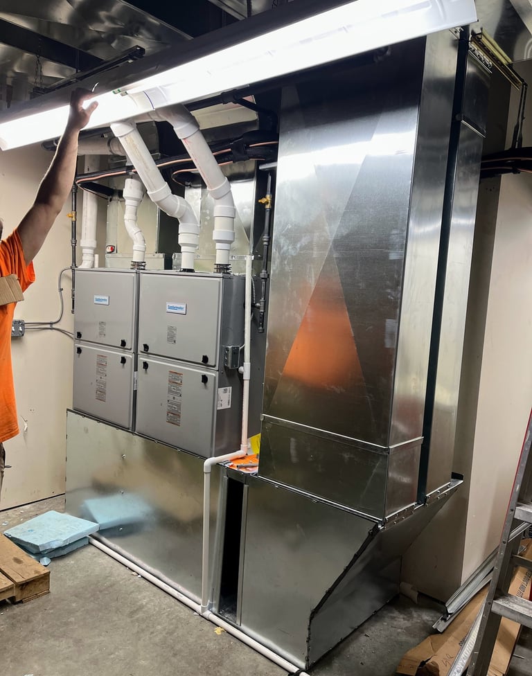 Tandem furnace installation at commercial building in Mayville will help heat and cool a large space