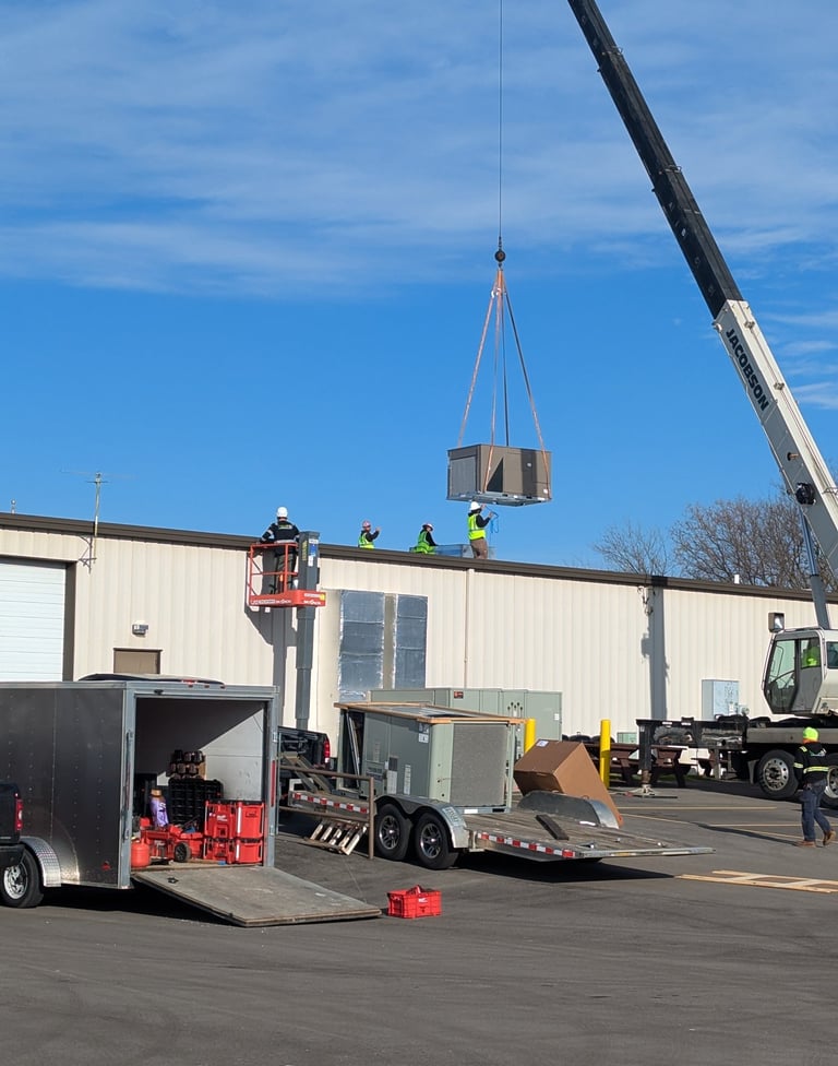 Installing a commercial roof top unit in Watertown, WI.