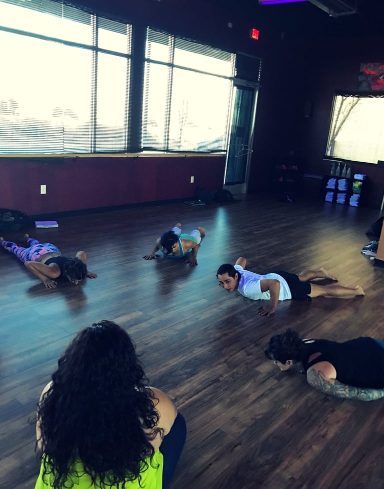 Joshua Fabia teaching a class to new School of Self-Awareness students