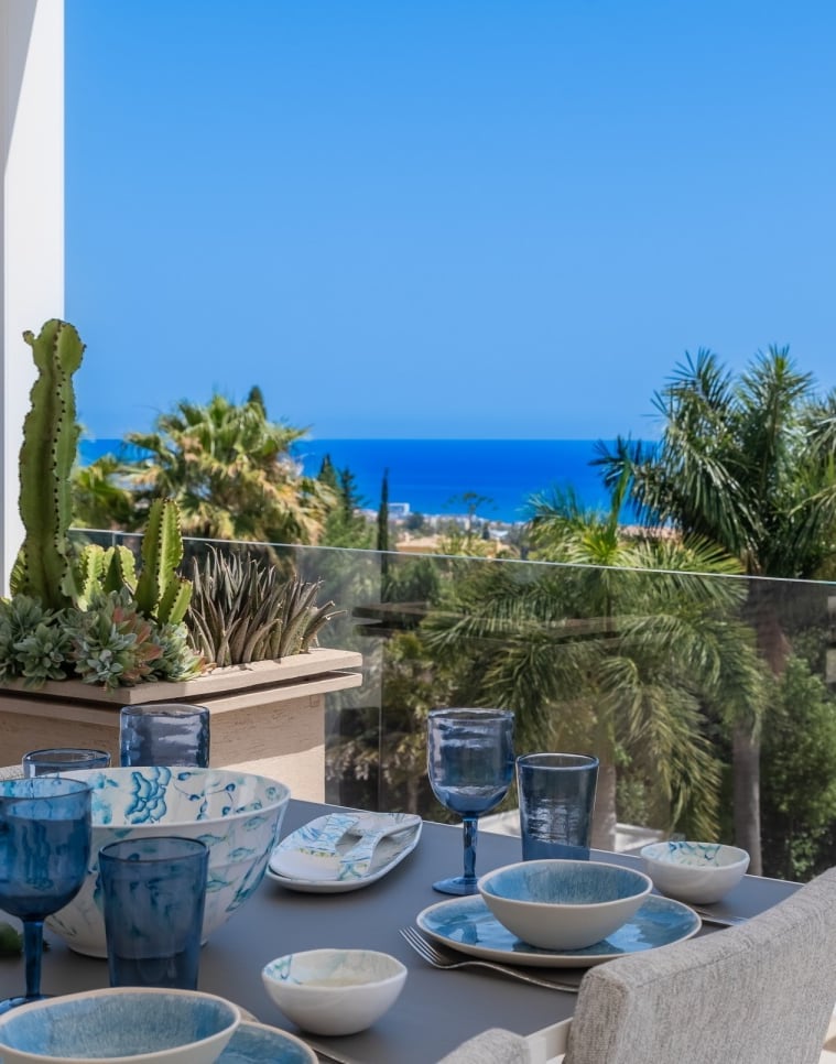 Rooftop dining area with sea views at Villa Serenity