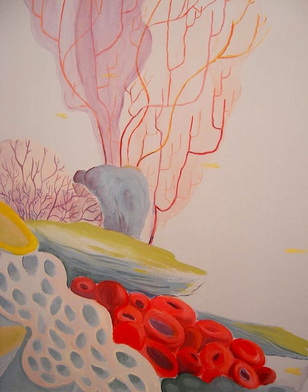 A modern kid's coral reef mural with bright red coral and sea anemone.
