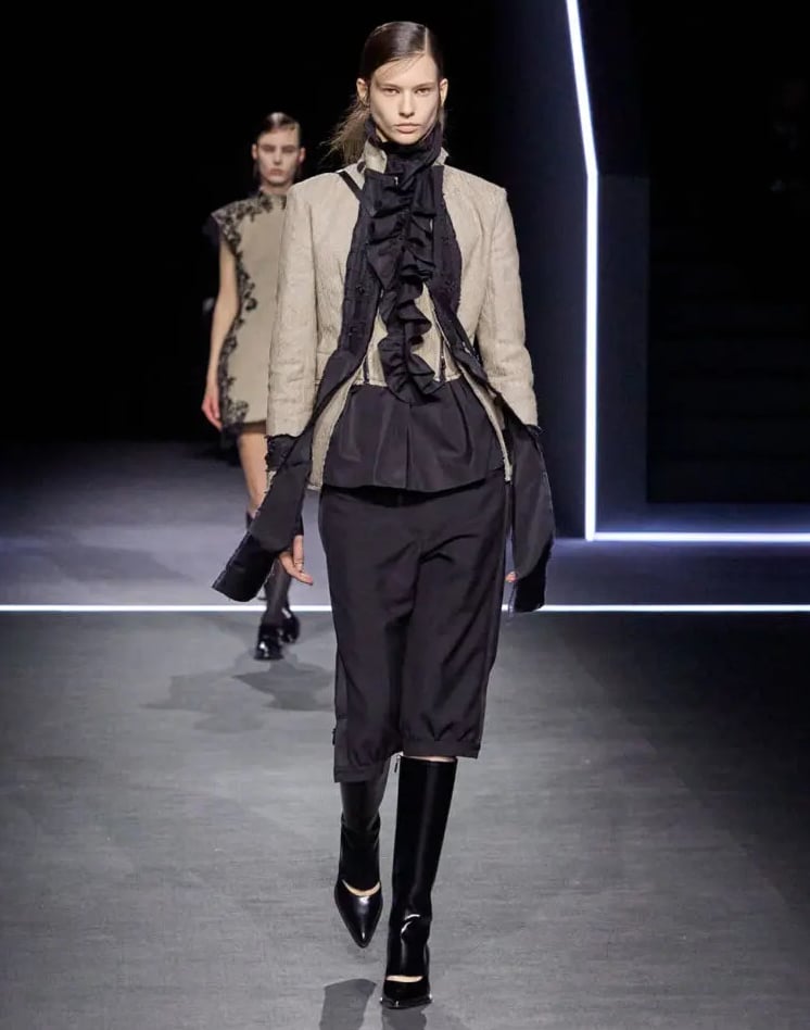 Blazer and ruched top with cropped trousers.