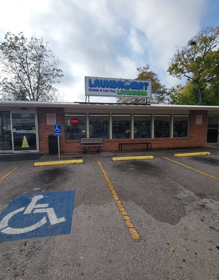 Steel Drum Laundry storefront and free parking at 311 W. Hopkins St. in San Marcos, TX