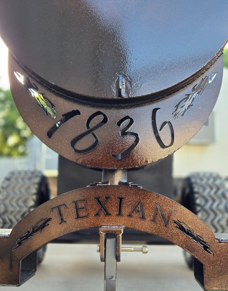 metal cut outs that say 1836 texian