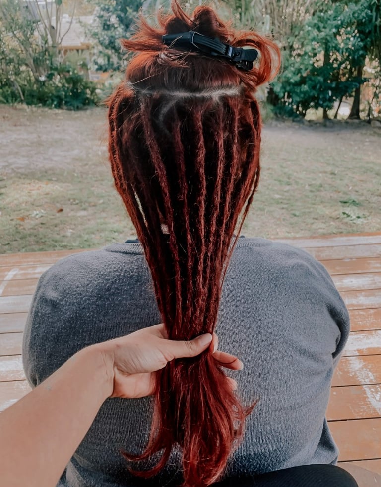 a woman with dreadlocks