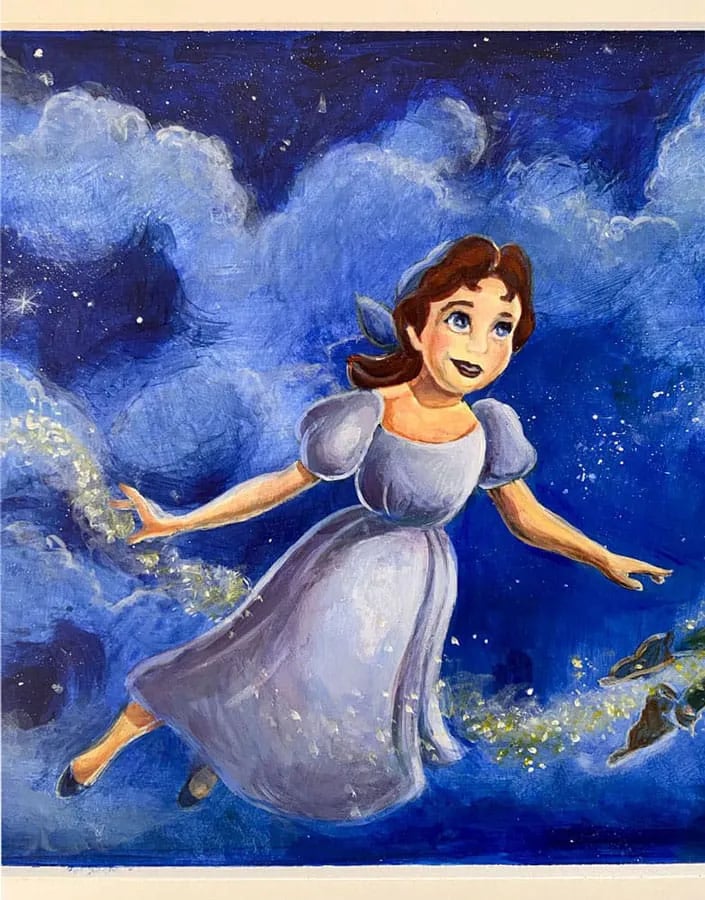 Close-up of hand-painted girl flying through a dark blue sky with gold glitter dust.