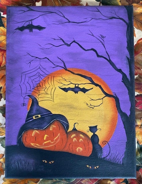 Pumpkins, night moon, bats, eerie eyes