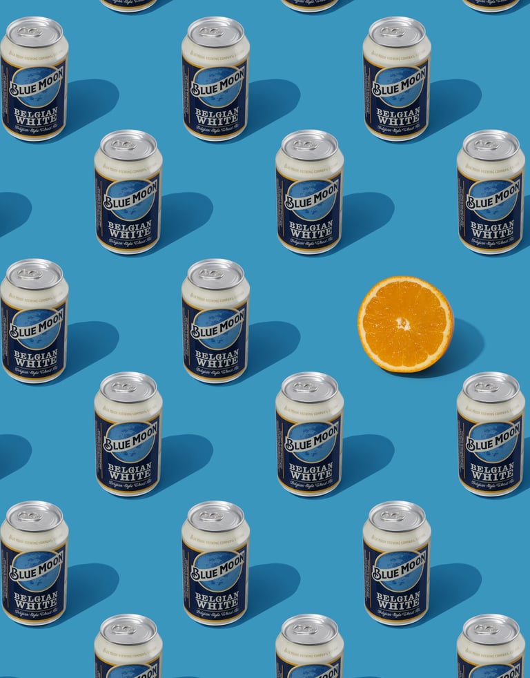 beer cans pattern and an orange