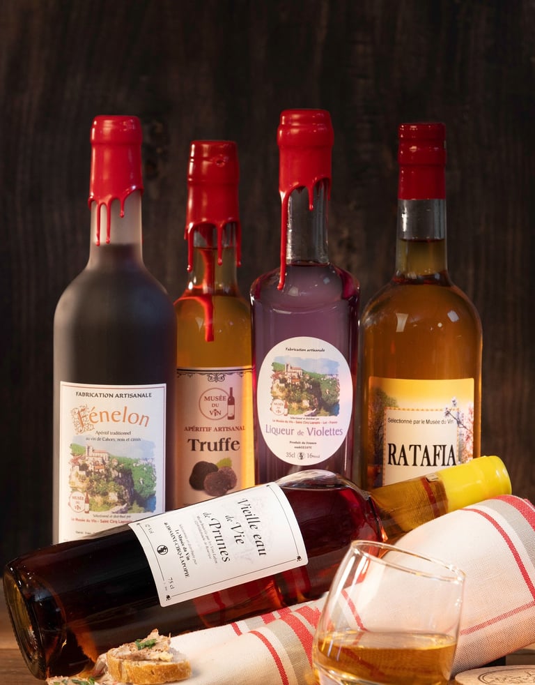 Fénelon de Cahors, apéritif à la truffe, liqueur de Violette, ratafia, vieille eau de vie de prunes