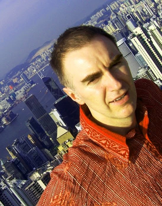 Karl Drury in Hong Kong: Karl photographed in Hong Kong in 2007 with the city skyline during an extended stay in Asia