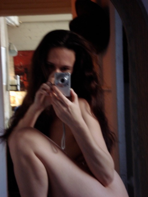 self portrait of Jennadea with old camera