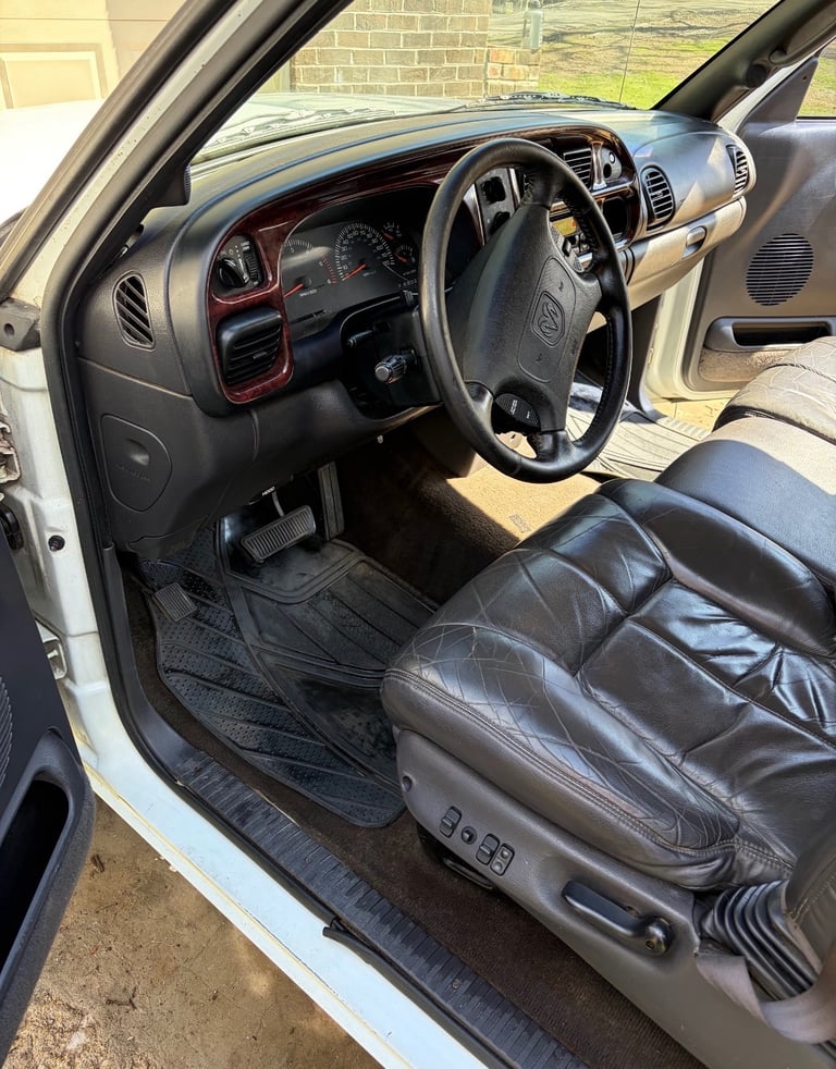 Interior view of white truck fully detailed by j&s auto detailing